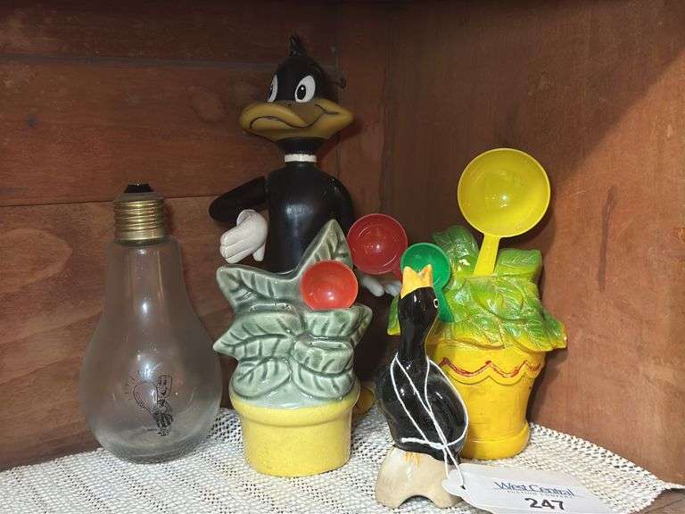 Daffy Duck Figure, Lightbulb Bank and More image