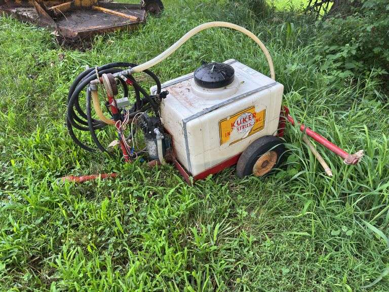 Pull type lawn sprayer with electric pump, been setting outside for years ￼ image