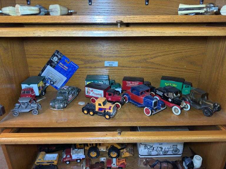 Collection of Diecast Advertising Trucks and Model Cars image