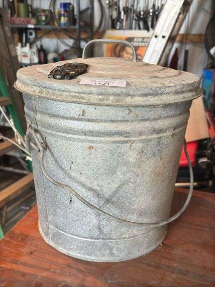 Galvanized Metal Trash Can with Lid and Horse Shoe Emblem image