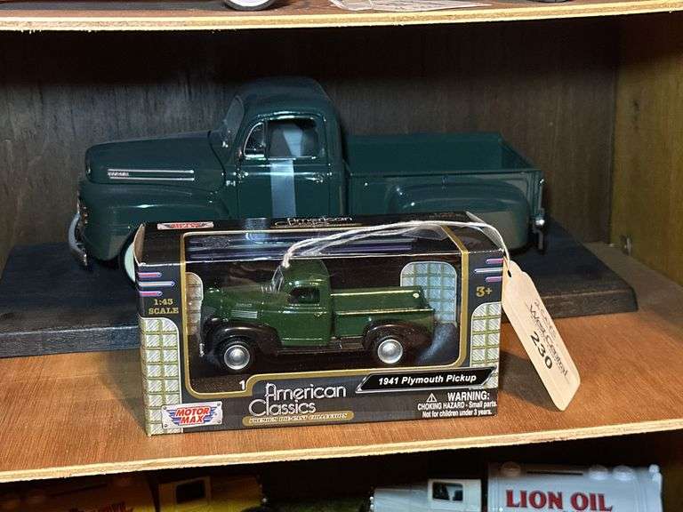 Two Diecast Trucks: 1948 Ford F-1 and 1941 Plymouth Pickup image