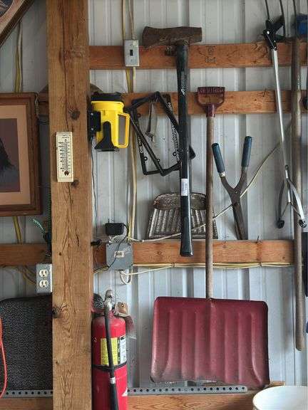 Variety of Tools: Axe, Snow Shovel, Landscape Rake, and More image