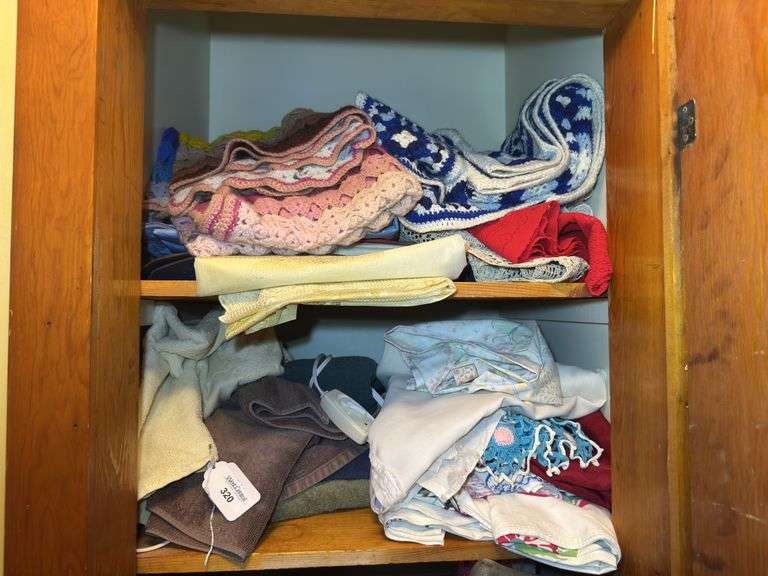 Shelf of Textiles: Towels, Crochet, and More image