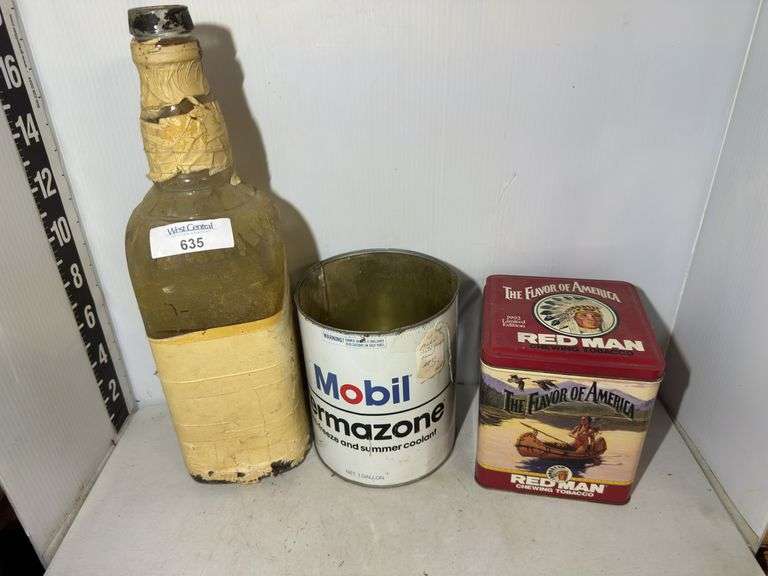 Mobil Permazone Can and Red Man Tobacco Tin with Liquor Bottle image