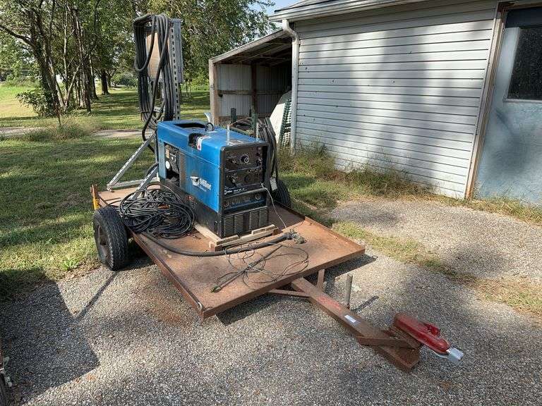 Miller Bobcat 225 NT Welder Generator with Breaker Box and Trailer image