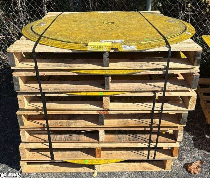 7 South Worth Pallet Discs. Wooden skids included and banded together all used image