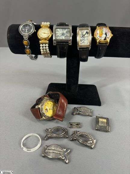 6 Wrist Watches (2 are Looney Tunes) and Watch Pieces.  1 watch band needs repair. image