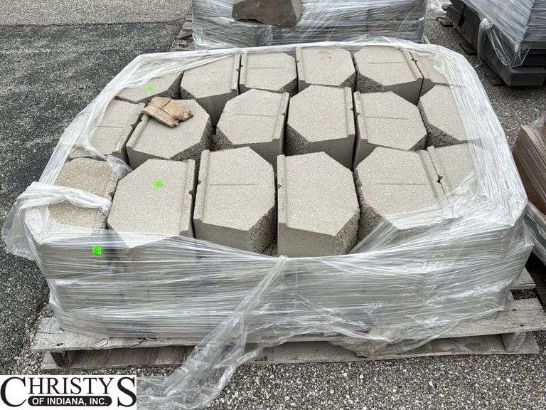 Skid of Grey Retaining Wall Block Some May Have Damage