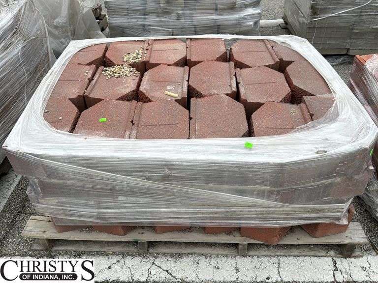 Skid of Red Retaining Wall Blocks Some May Have Damage