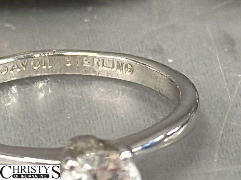 4 Rings and Bracelet Marked Sterling