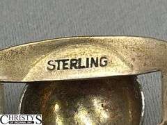 4 Rings and Bracelet Marked Sterling