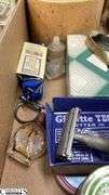 Razors, Blades, Remington Princess Electric Shaver in Original Box, Listerine, Killinger Hi-Jacs Cloth Coasters in Original Box, Hand Mirrors, Hair Combs, Perfume Bottles, Compact Purse Carry-All in Original Box, Bath Oil, Jergens Soap Bar