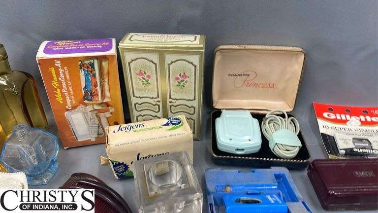 Razors, Blades, Remington Princess Electric Shaver in Original Box, Listerine, Killinger Hi-Jacs Cloth Coasters in Original Box, Hand Mirrors, Hair Combs, Perfume Bottles, Compact Purse Carry-All in Original Box, Bath Oil, Jergens Soap Bar