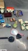 Razors, Blades, Remington Princess Electric Shaver in Original Box, Listerine, Killinger Hi-Jacs Cloth Coasters in Original Box, Hand Mirrors, Hair Combs, Perfume Bottles, Compact Purse Carry-All in Original Box, Bath Oil, Jergens Soap Bar