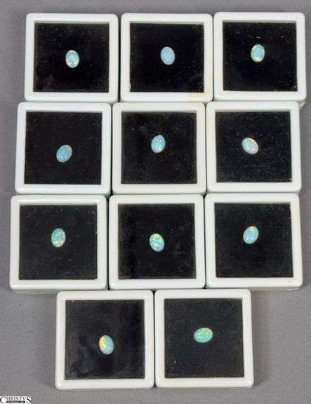 11 Oval Lab Opal Gemstones.  Each Approx. 8x6mm image