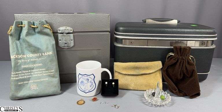 Pearl Earrings with Post Marked 14K, 2 Pair of Clear Crystal Stone Earrings, a Yellow Gold Color Pendant, Indiana State Police Mug, Ring Holder/Dish, 2 Marbles, Gerwin Shoe 20 Year Pin with Small Diamond, Small Samsonite Case/Luggage and a Metal File Box image