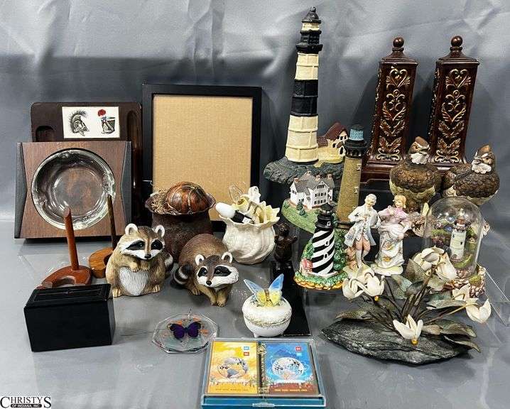 Assorted Tabletop Decor - Cast Iron Lighthouse Door Stop, Animal Figurines, Ashtray, Playing Cards - 12" T of largest image