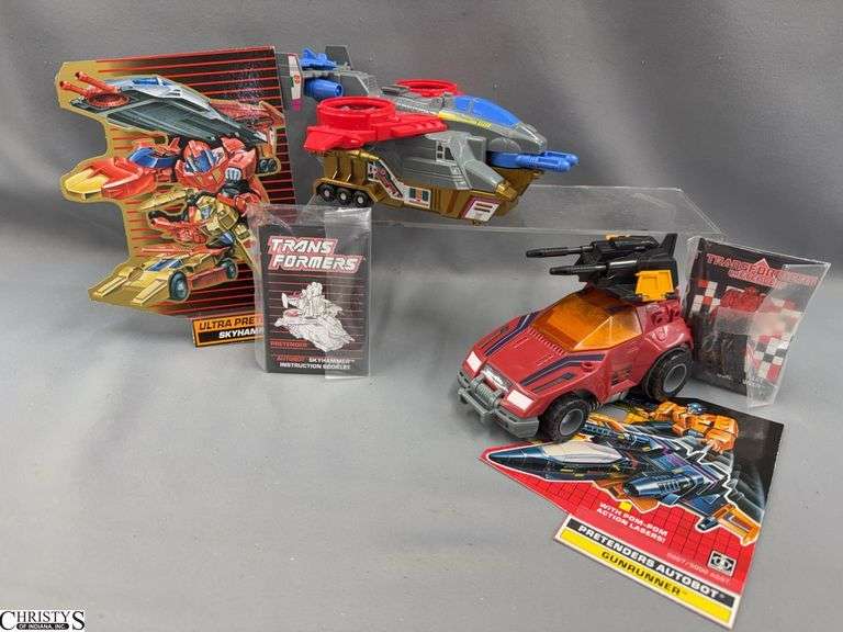 Transformers Pretenders Skyhammer and Gunrunner With Books and Weapons, Small Chip on skyhammer image