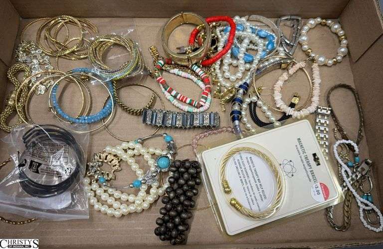 Approx. 42+ Bracelets- Some Gold Color, Pearl Type, a Magnetic Therapy Bracelet in Package and More