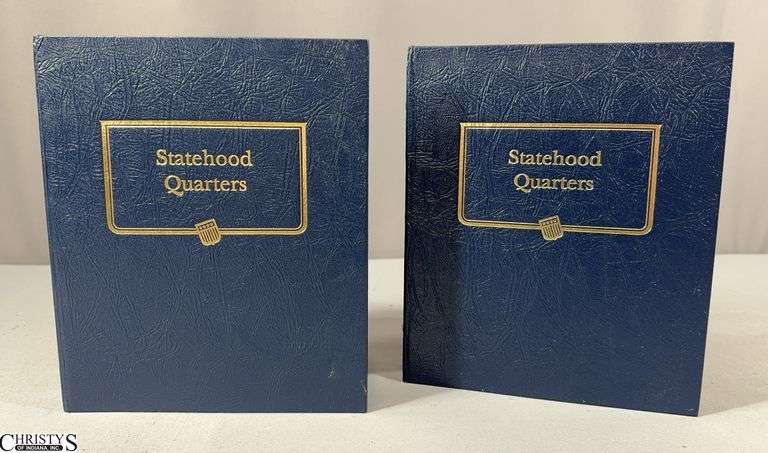 2 Full Blue Whitman Classic Statehood Quarters Collection Books.  There are a total of 100 Quarters (50 coins in each book) image