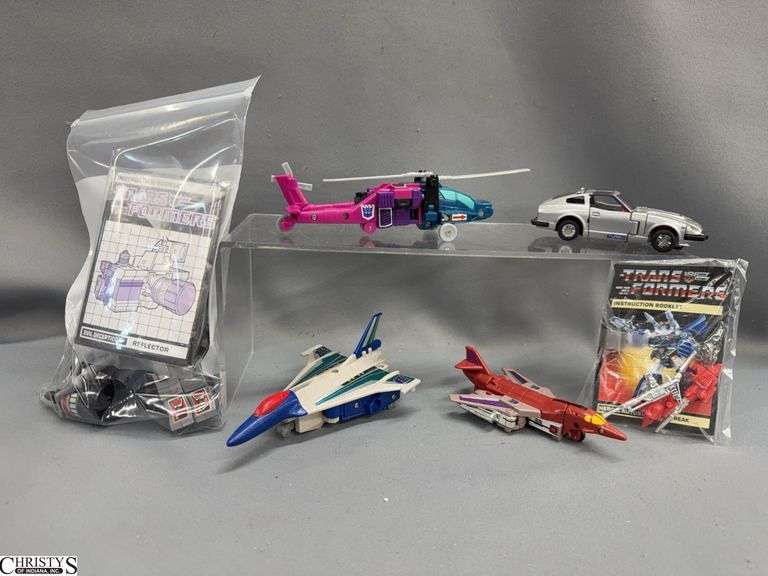 5 Transformers, Decepticon Reflector and Spinster, Autobots, Bluestreak, Jet Planes, Hellicopter image
