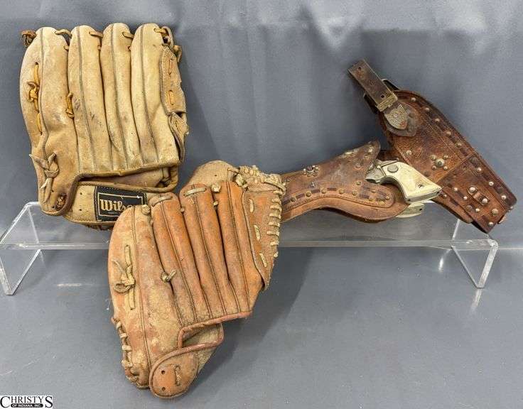 Two Baseball Gloves, Toy Guns - Some wear