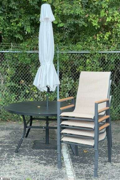 7pc Outdoor Patio Set - Includes 60" Round Aluminum Table, Patio Umbrella, 4 Chairs, Umbrella Stand - 60" x 28" of table - some scuffing/wear from use image