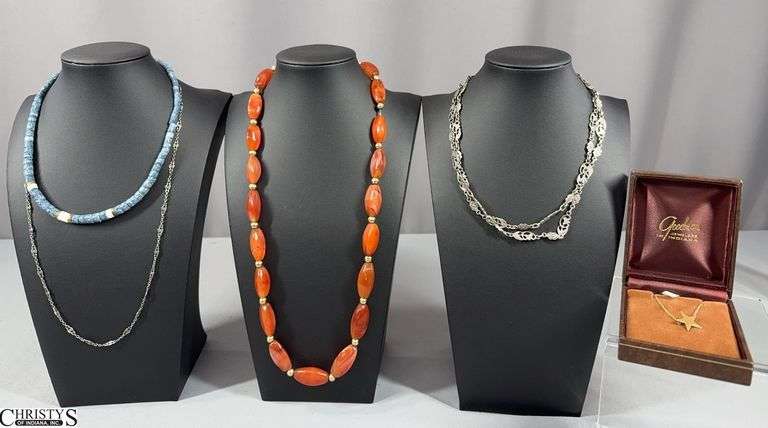 5 Necklaces- 2 Silver Tone Chain Necklaces (1 marked 800), One Gold Star Necklace Marked Gold Filled, a Carnelian Beaded Necklace with Torpedo Shaped Beads Alternating with Round Gold Tone Beads and a Blue/White Coral Necklace image