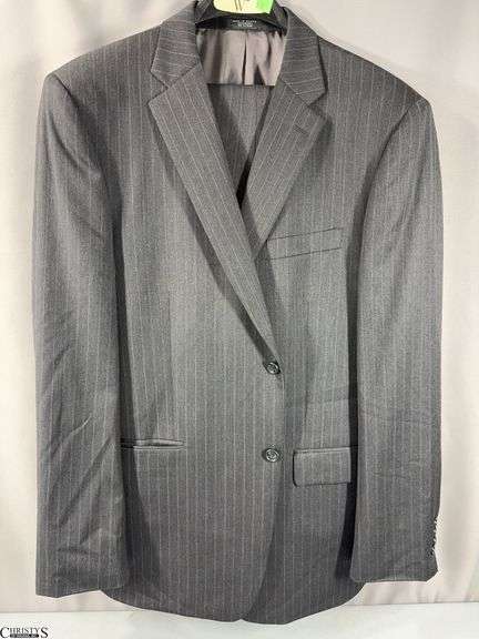 Jones New York Black Pin Stripe Suit.  Jacket marked Made in Mexico 100% Wool L44 and Trousers are Marked L37.5.  There are no other size markings however trousers look to be size 36. image