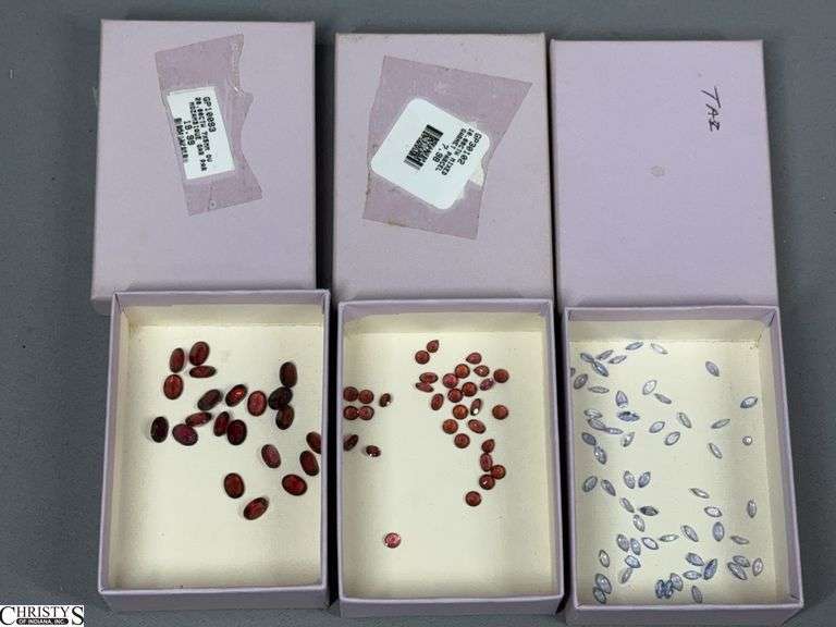 1 Small Box of Loose Tanzanite Gemstones and 2 Small Boxes of Garnet Gemstones image