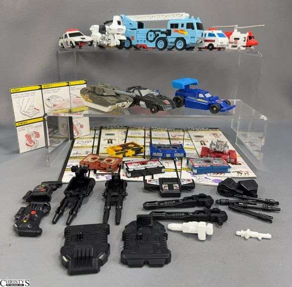 Vintage Transformers Combiner Defensor, With Parts, Cassette Transformers, Guzzle, Fizzle and Sizzle Sparking Cars image