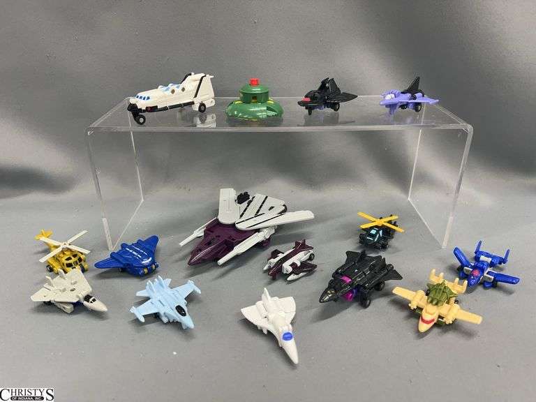 14 pcs of Mini Transformer Jets, UFO and Flat Top Carrier image