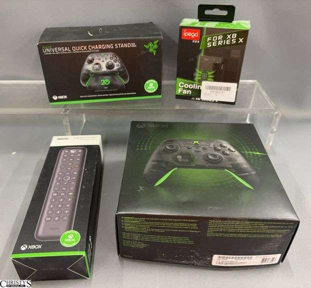 Xbox Controller, Charging Stand, Remote, and Fan Lot image