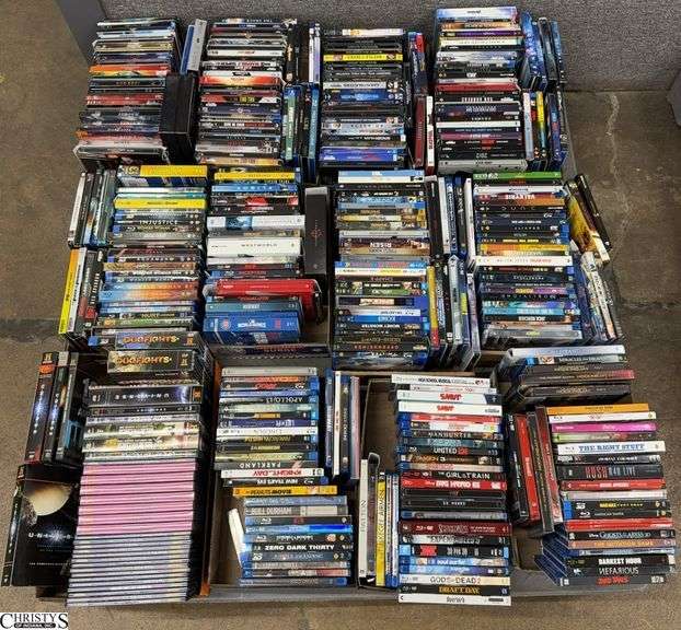 Skid With DVD's Jaws, Mad Max, A Man Called Otto, Aquaman, Oppenheimer, Dogfights, XMEN, Wonder Women Movies, History Channel Series The UNIVERSE, Minions, Risen, and MUCH MORE image