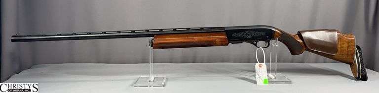 Winchester Super-X Model 1 Shotgun 12 ga. SN: M26669 with Full Trap Choke.  The original gun box has been found.  See Photos image