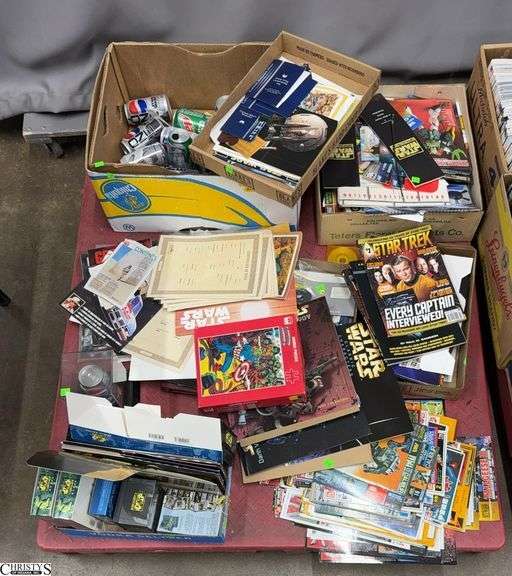 Skid Lot With Star Wars Empty Soda Cans, Star Trek Magazines, Calendars, Merchant Boxes Broken Down and Some Have Been Cut, Open Jigsaw Puzzle, Certificate of Titles to Collectible Cars, Gundam Magazines image