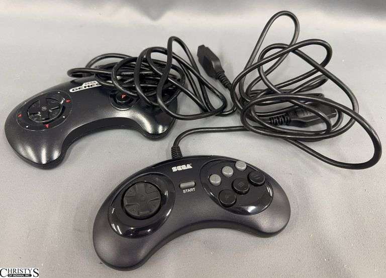Two Sega Genesis Game Controllers image