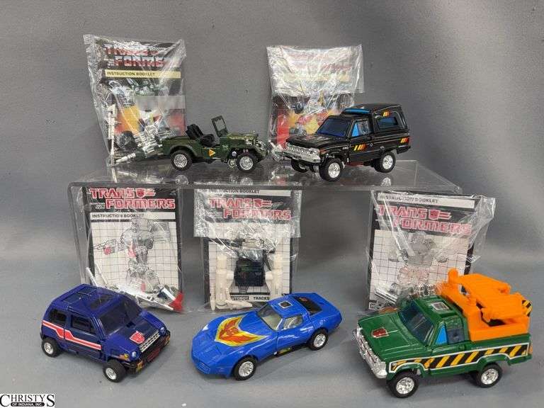 5 Heroic Transformers, Trailbreaker, Hoist, Tracks, Skids, Hound, With Books and Weapons image