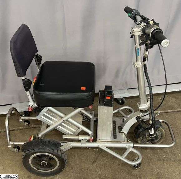 Triaxe Sport Foldable Mobility Scooter - 34" x 38" as sits - does power on, has extra battery