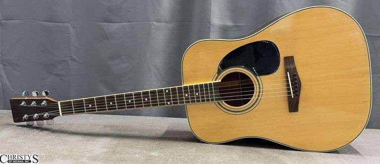 Unmarked Acoustic Guitar Some Scuffs and Scratches image