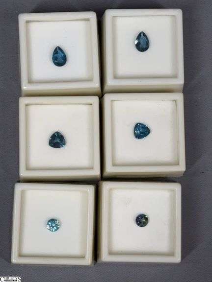 6 Gemstones- 4 London Blue Topaz Gemstones, 1 Round Diamond Cut Blue Zircon, 1.00ct. 6mm and 1 Round TRTD Mystic Topaz Gemstone image