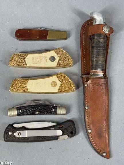 5 Pocket Knives and 1 Fixed Blade Knife with Sheath- Boker Solingen Germany 4-Blade 3 3/4" Closed, Buck 442 Single Blade Knife 4 1/4" Closed,  2 Single Blade Franklin Mint Colt 1955 Python .357 Magnum Pocket Knives ( 1 is missing a decorative piece), K-Bar 2-Blade Knife 3 1/2" Closed  and an Office Boy Scouts of America Fixed Blade Knife with Sheath.  Black 4 1/4" and Total Length Approx. 8 1/2" image