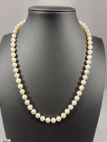 Pearl Necklace with the Clasp Marked 14 KG.  Includes a Black Necklace Holder image