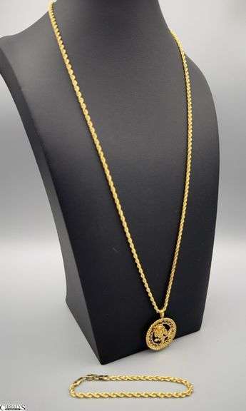 14K Yellow Gold Chain with Unmarked Yellow Gold Floral Pendant and a Matching14K Yellow Gold Chain Bracelet