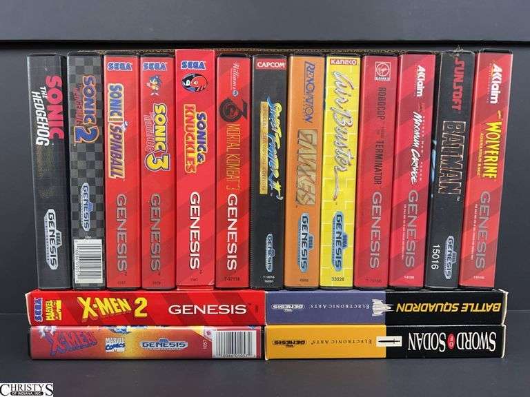 Collection of 17 Sega Genesis Video Games with Cases and Manuals image