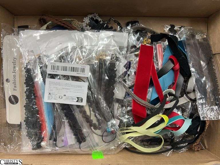 A Group of Satin, Cloth, Leather-Like Necklaces