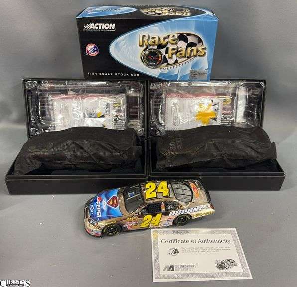 Two Jeff Gordon and Tony Stewart Race Car Collectibles image