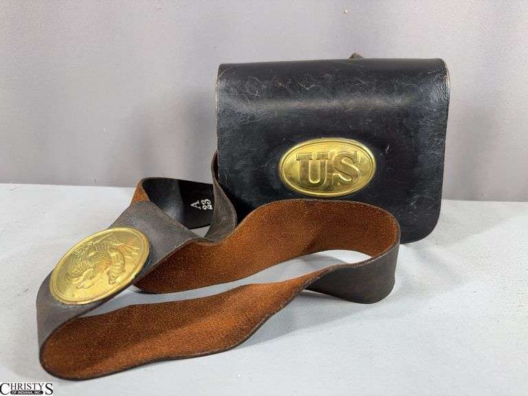 W.K. Wilkinson Black Leather Cartridge Box/Pouch.  US Plate on the outside.  Inner tins, an implements pouch and strap on the outside.  Strap marked A23. image