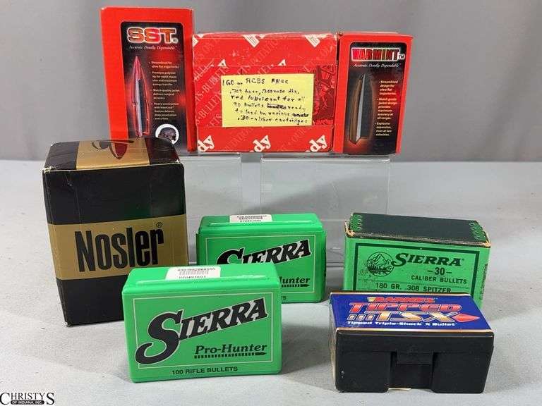 Misc. Boxes of  Caliber Bullets- 1 Full Box of  Sierra Pro-Hunter  30 cal.  125 GR Spitzer. a Mostly Full Box of Nosler 30 cal. and 6 Partial Boxes of Various Brands image