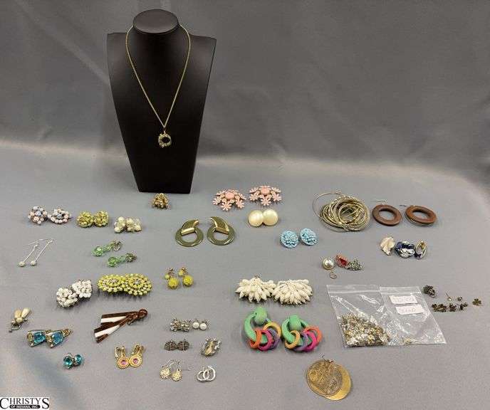 27 Pairs of Earrings- 6 Pairs Marked 925, 1 Pair Marked Trifari and 1 Pair has a Matching Necklace.  Also included is a bag of Single Hoop Earrings (no matching sets). 7 Other Single Earrings (1 Trifari, 1 Giovanni and 1 W. Germany)   and a Small Baggie of Earring Backs image